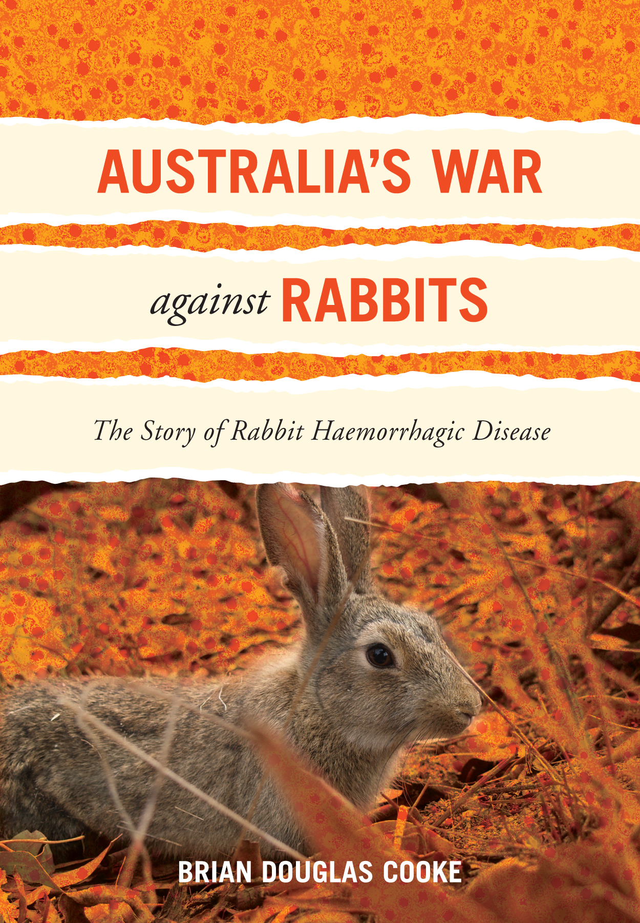 Cover of 'Australia's War Against Rabbits' featuring a photo of a rabbit amongst the undergrowth, overlaid with an orange-stained image of rabbit haem