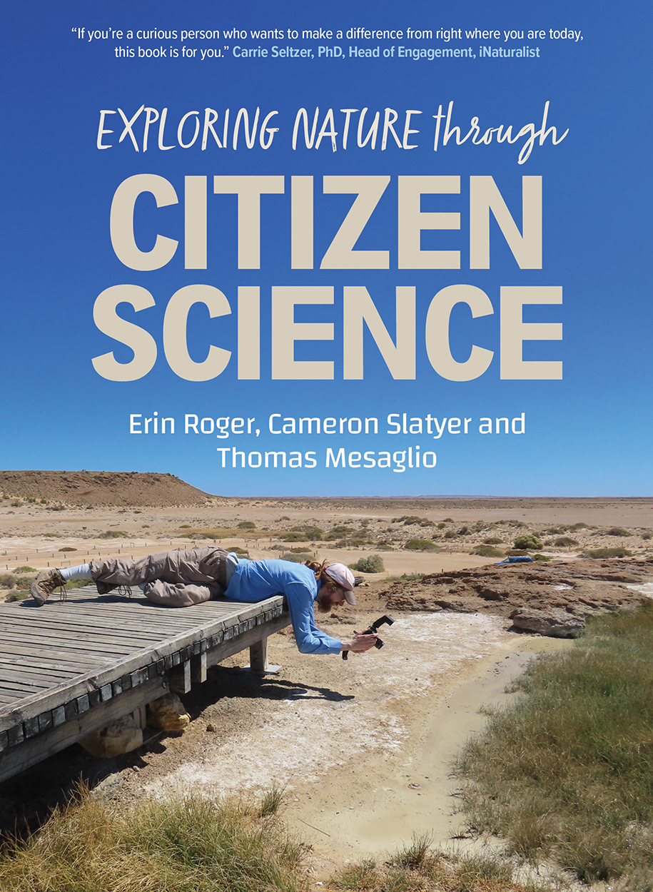 Cover of 'Exploring Nature through Citizen Science', featuring a citizen scientist laying prone on a boardwalk in the desert to photograph a mound spr
