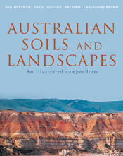 The cover image of Australian Soils and Landscapes, featuring a panoramic view of a cliff side with strips of different red, yellow and grey earth, wi The cover image of Australian Soils and Landscapes, featuring a panoramic view of a cliff side with strips of different red, yellow and grey earth, wi