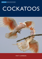 The cover image of Cockatoos, featuring two pale pink cockatoos with their wings spread, one in flight over the other which is clutching a thin branch The cover image of Cockatoos, featuring two pale pink cockatoos with their wings spread, one in flight over the other which is clutching a thin branch