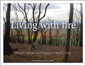 The cover image of Living with Fire, features multiple tree trunks which have had all of their foliage burnt off, in the back drop a green field is vi The cover image of Living with Fire, features multiple tree trunks which have had all of their foliage burnt off, in the back drop a green field is vi