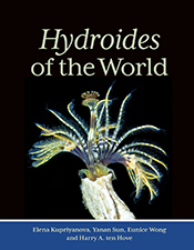 Cover of 'Hydroides of the World' featuring a stunning blue and yellow hydroid fanned out against a black background. Cover of 'Hydroides of the World' featuring a stunning blue and yellow hydroid fanned out against a black background.