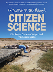 Cover of 'Exploring Nature through Citizen Science', featuring a citizen scientist laying prone on a boardwalk in the desert to photograph a mound spr